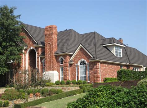 metal house with stone|stone coated metal shingles.